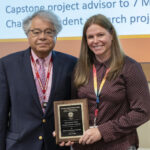 Dr. Hakkak and Dr. Jansen with Dr. Jansen holding her award